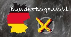 Deutschland in den Nationalfarben mit nebenstehendem Wahlkreuz